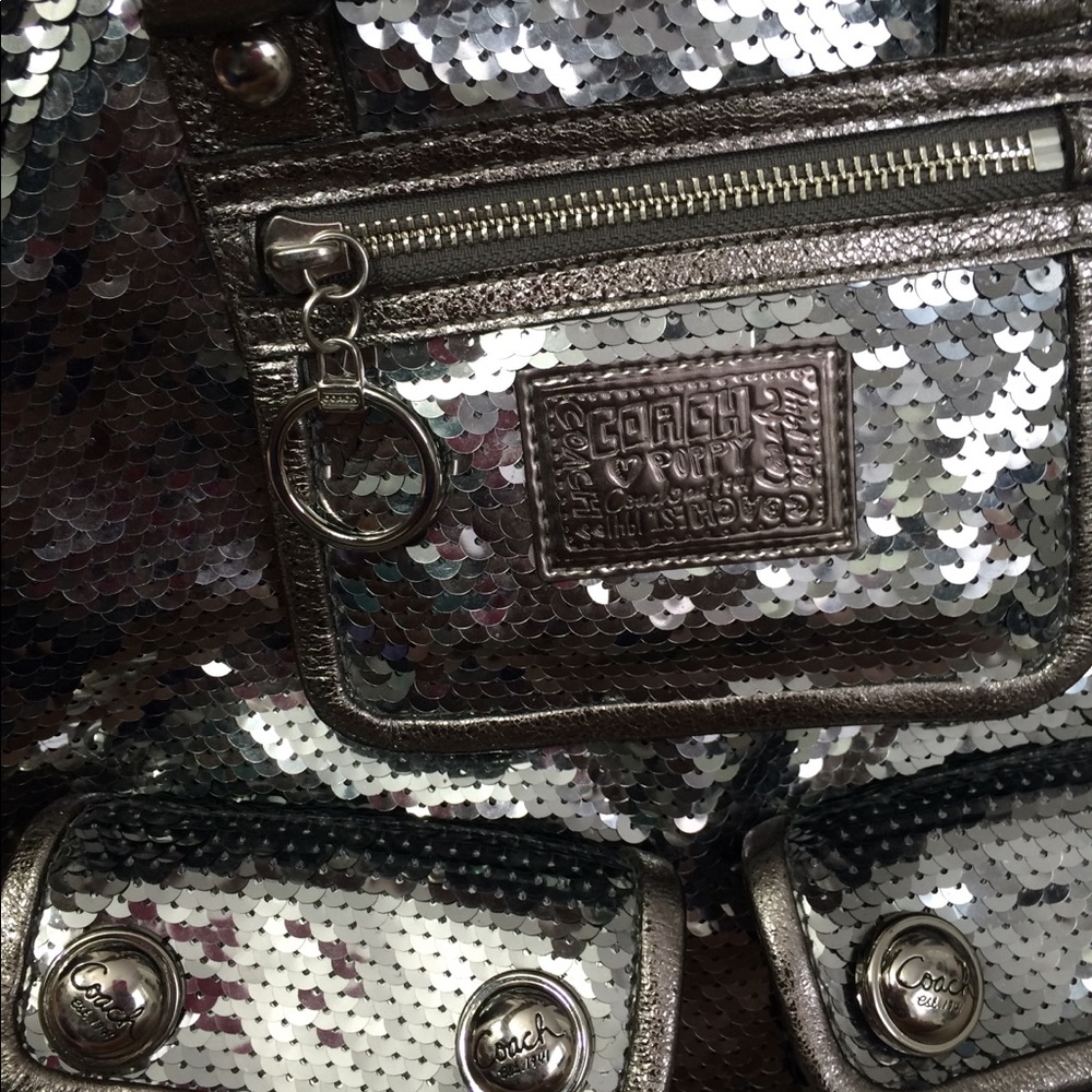 Authentic Coach spotlight silver sequin purse.